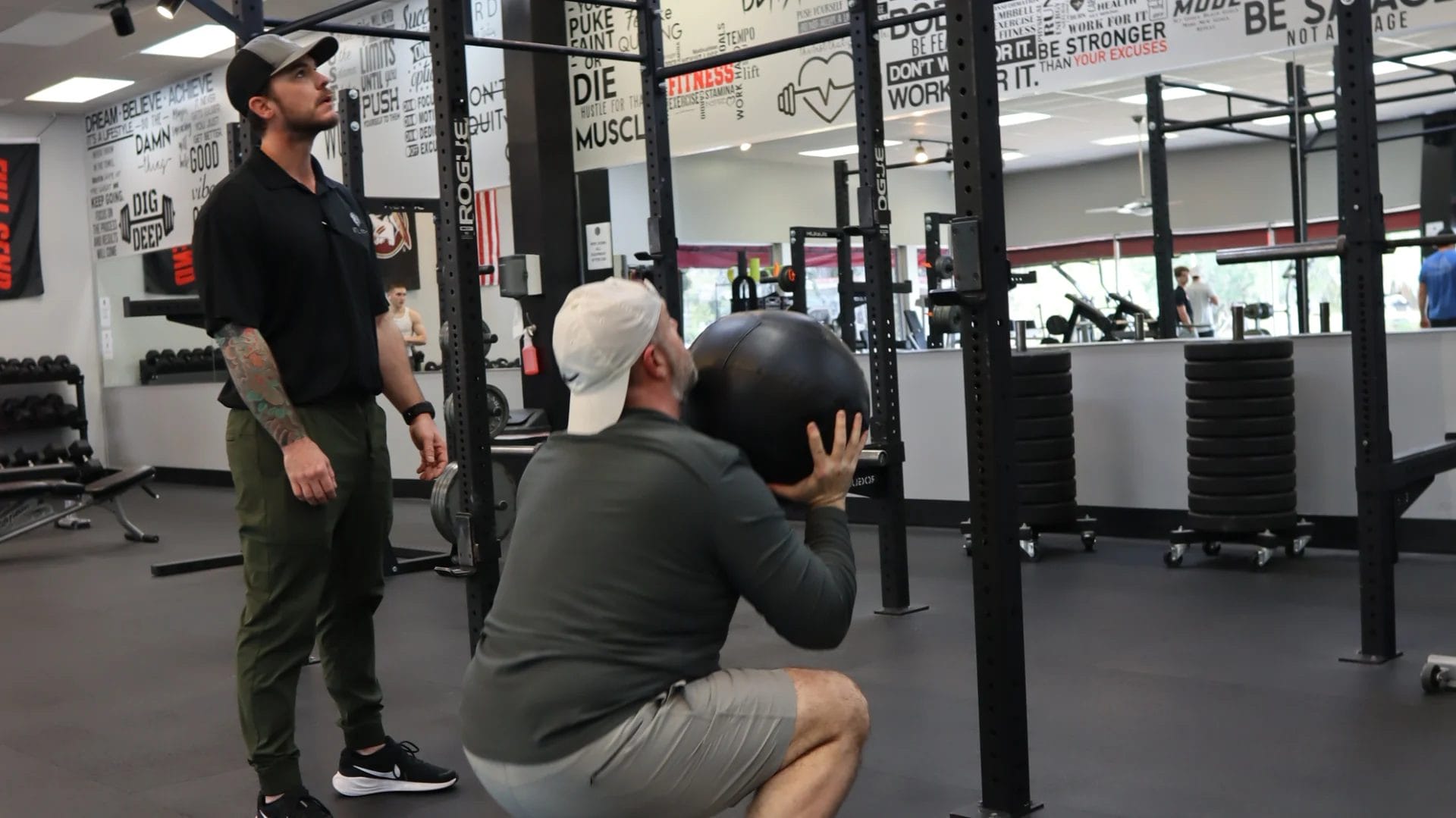 Personal training with coach at Atlas Fit